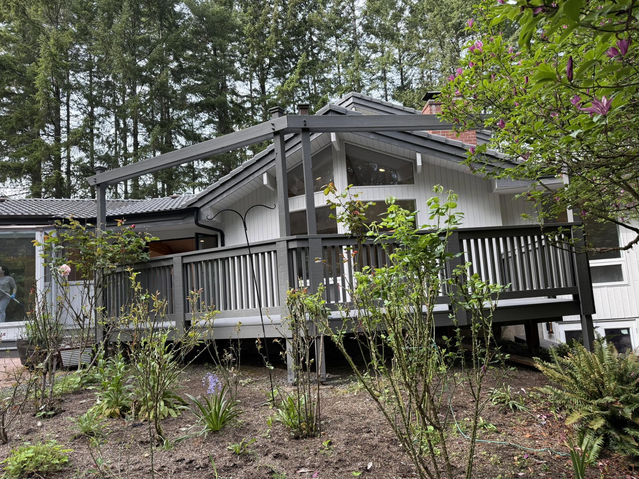 Deck and exterior painting in Kent, WA Exterior deck and siding painting on a King County home near Kent, WA